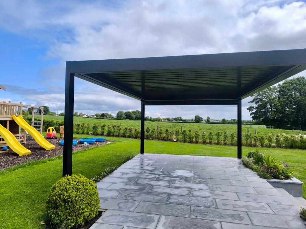 Free-standing bioclimatic pergola in an Irish garden