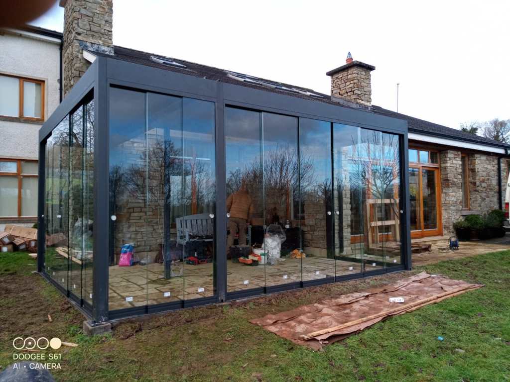 Glass Walls for Pergolas: Turning a Patio into an All-Season Garden Room
