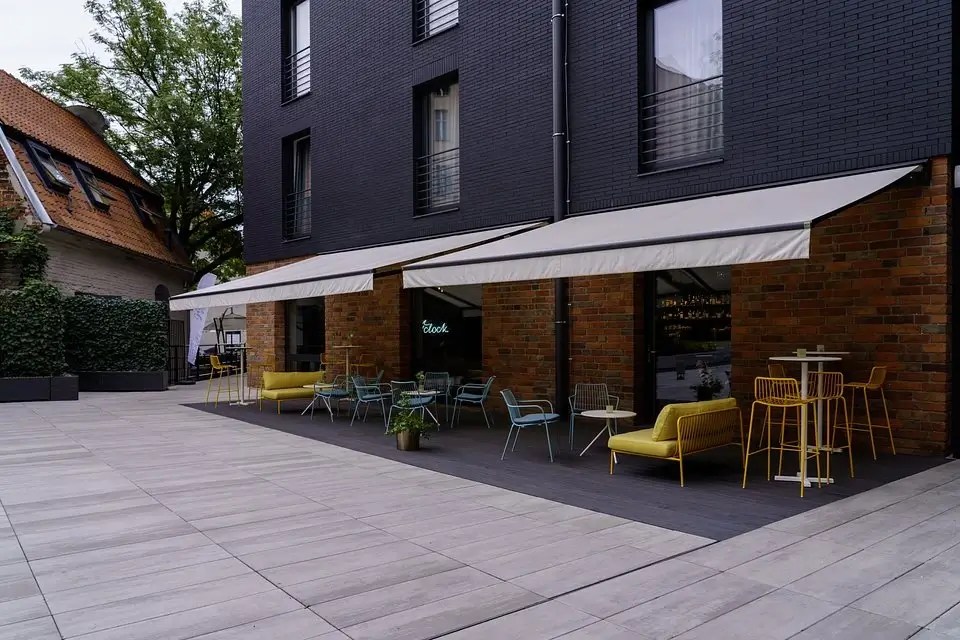 Commercial awnings shading a café terrace